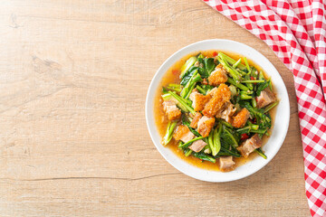 Stir-fried kale vegetable with crispy pork