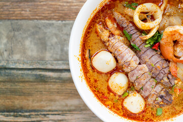 spicy seafood noodles bowl in Thai style