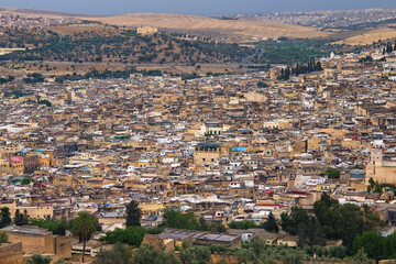 Fototapeta premium Aerial view of the Fez el Bali medina. Is the oldest walled part of Fez, Morocco. Fes el Bali was founded as the capital of the Idrisid dynasty between 789 and 808 AD