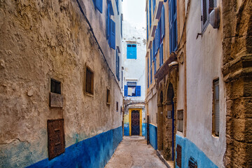 Fototapeta na wymiar One of the narrow streets in the medina of Essaouira in Morocco.