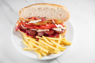 Kumru is a Turkish sandwich on a bun, typically with cheese, tomato, and sausage. The name of this street food translates as collared dove, and derives from the shape of the sandwich. Street Food