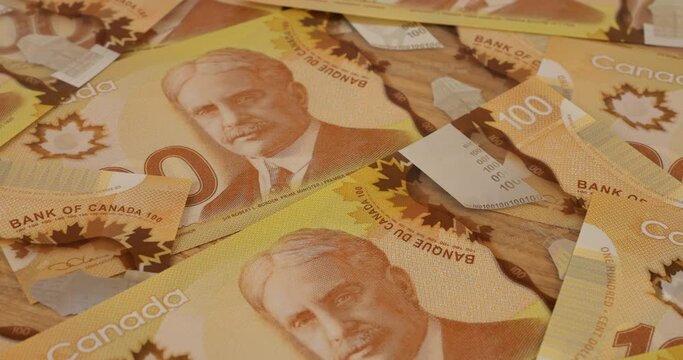 Canadian 100 dollar polymer banknotes with a portrait of Robert Borden.