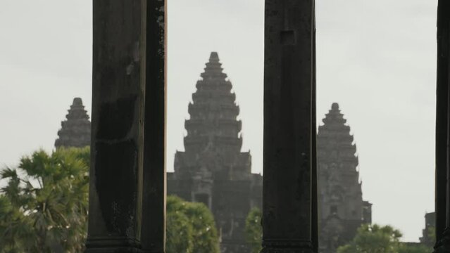 Travel Tourist Taking Photo of Angkor Wat in The Morning with Smartphone Slow Motion