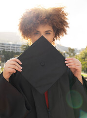 University student girl, portrait and graduation cap to hide face with success, achievement and...