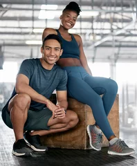 Fotobehang Persoonlijk Fitness, portrait or personal trainer with a happy client at gym for training, exercise or body workout. Team partnership, Indian coach or black woman smiles with pride together in a health club  © J Maas/peopleimages.com