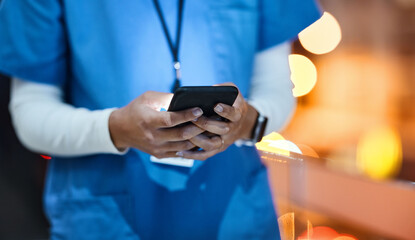 Doctor, phone and healthcare worker hands of a hospital employee at night on social media. Online...