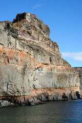 Cliff in holiday village Puerto de Mogan © Sunday