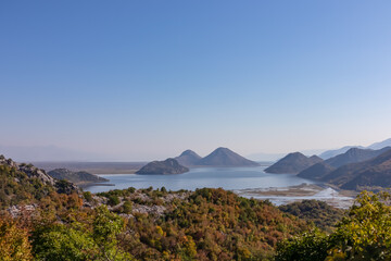 Panoramic view of Lake Skadar National Park in autumn near tourist village Virpazar, Bar, Montenegro, Balkans, Europe. Travel destination in Dinaric Alps near Albania. Stunning landscape and nature