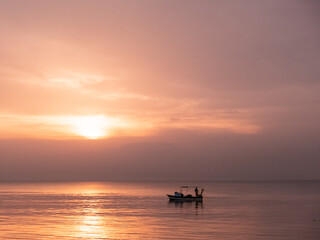 sunset red silhouette boat sea