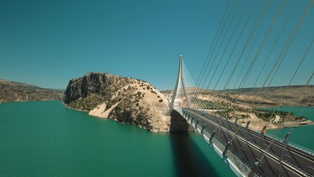 Nissibi Bridge Adiyaman, Suspended Bridge. The bridge connecting the city of Adıyaman and Diyarbakır. Vehicles passing over the suspension bridge.