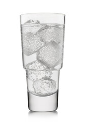 Luxury Glass of lemonade soft drink with ice cubes and bubbles on white background. Saprkling mineral water.