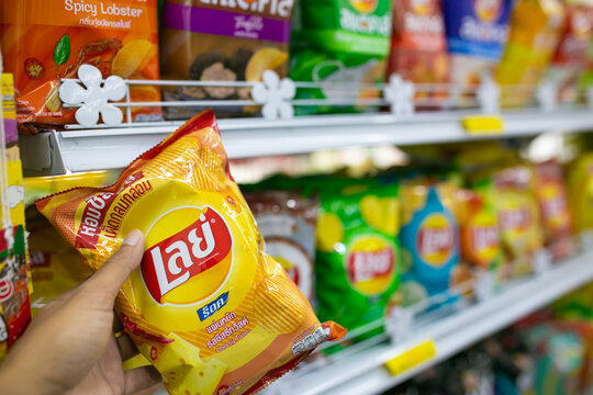 Nakhonsawan, Thailand - January 26, 2023: Potato chips selection in a supermarket.