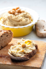 still life of hummus with bread