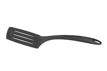 Black plastic cooking spatula isolated on white background. Kitchen utensils.