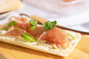 Parma ham and rocket ciabatta (Italian bread) with cream cheese.