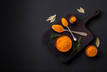 Bright yellow turmeric or curry spice for Asian food preparation