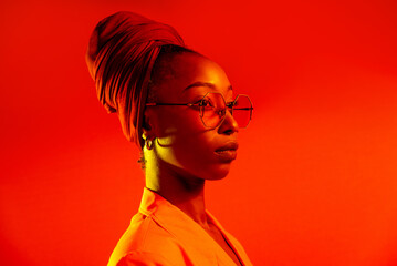 Beautiful african american woman with afroturban scarf and stylish clothes - Portrait of young...