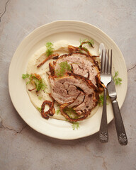 Roasted pork belly roll with fennel crust