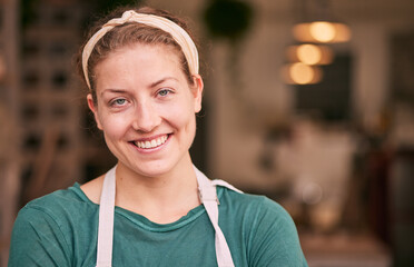 Face portrait, small business owner and woman in shop or store ready for hard work, job or career goals. Boss, manager and confident, happy and proud female employee from Canada with success mindset.