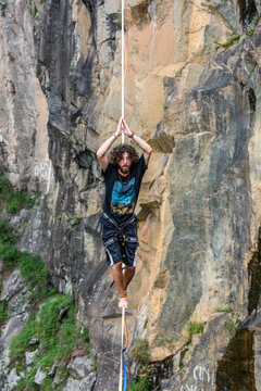 Man walking on slackline, Dibs Quarry, Maripora, Sao Paulo State, Brazil