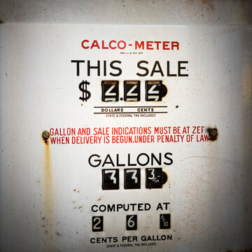 Close up, the face of a old gasoline pump, 26 cents per gallon.