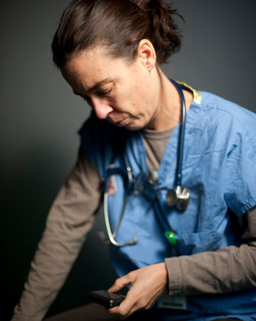 Studio portrait of 42 year old caucasian female registered nurse.