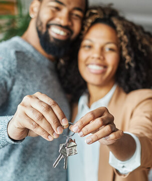 young couple new house keys buy real estate home agent agreement investment apartment