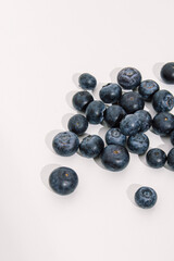 Blueberries on white background. Vertical
