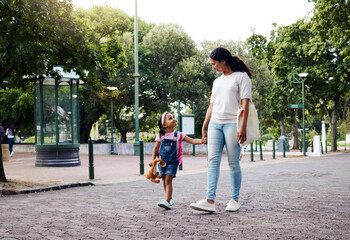 Park, walking and mom holding hands with girl enjoy weekend, summer holiday and adventure outdoors. Love, black family and mother with child in morning for back to school, kindergarten and education