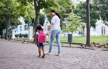 Kindergarten, student and mother with daughter walking to school, relax and bonding while holding...