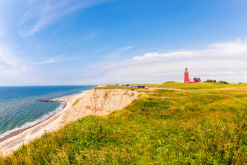 View on Bovbjerg Lighthouse and coastline in Lemvig Denmark. The Lighthouse was built in 1877.