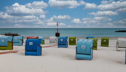 Beach chairs on the beach of island Heligoland. North sea. Germany.