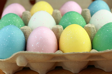 Various coloured Easter eggs in pastel colours