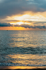 Vertical sunrise landscape on a cloudy day