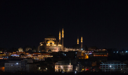 Fototapeta na wymiar Karakoy, Istanbul, Turkey, 01.20.2023: Night view of Istanbul night landscapes. Istanbul night silhouette. a Mosque in Istanbul