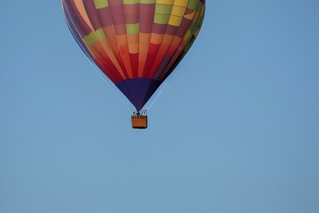 Fototapeta premium Blue air balloon flying in the clear blue sky. High quality photo - generative ai