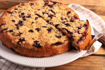 cake with berries and crumble topping