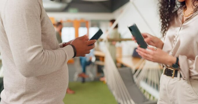 Hands, phone or networking with a business team sharing wireless information or data in the office. Contact, connect or mobile app with a man and woman employee using bluetooth communication at work