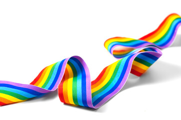 Colorful rainbow ribbon close up design, isolated on white background. LGBT colourful corner design. Gay pride design. Curly, waving ribbon or banner with flag of LGBTQ pride art. 