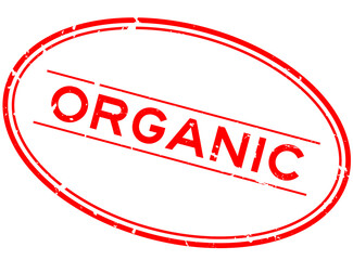 Grunge red organic word oval rubber seal stamp on white background