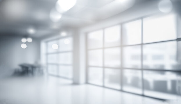 Abstract blurred modern workspace background, white indoor interior office or hospital with window and the light with copy space. Blurry backgrounds for advertising and business presentation.
