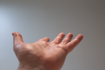 Obraz premium hand with open palm showing skin texture minimalist isolated