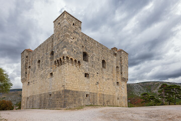 Standing in front of the Nehaj fortress, on the top of the hill