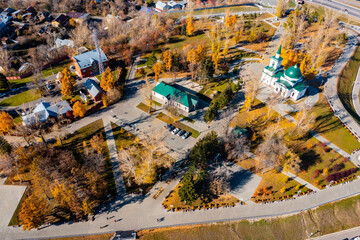 Christian church in Russia at sunset. Temple Ioanna Predtechi. Photos of the city of Barnaul from a height in the summer. Aerial photography, Russia, Altai Krai