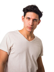 Handsome and fit young man standing on white background