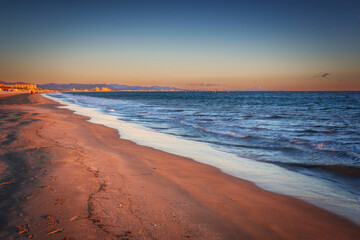 Playa de las Arenas beach by the Mediterranean Sea in Valencia at sunrise. Spain