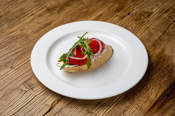 delicious bruschetta with baked pepper and cheese
