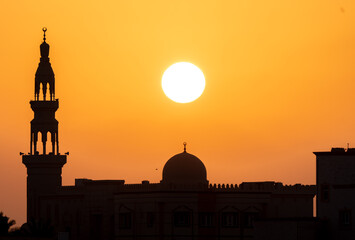 mosque at sunset - Powered by Adobe