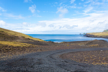 Vestmannaeyjar island beach day view, Iceland landscape.