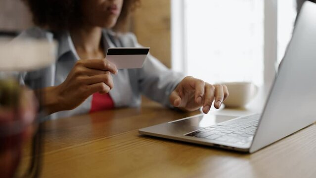 Close-up of woman having credit card debt, overdraft, financial problems